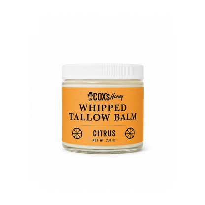 Jar of Coxs Honey Whipped Tallow Balm with an orange label on a white background