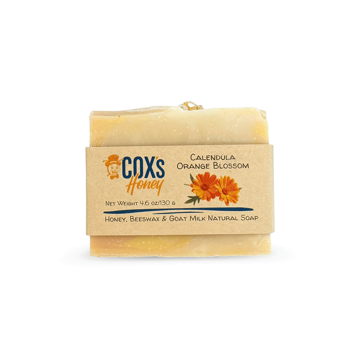 Bar of calendula orange blossom soap with Coxs Honey packaging on a white background