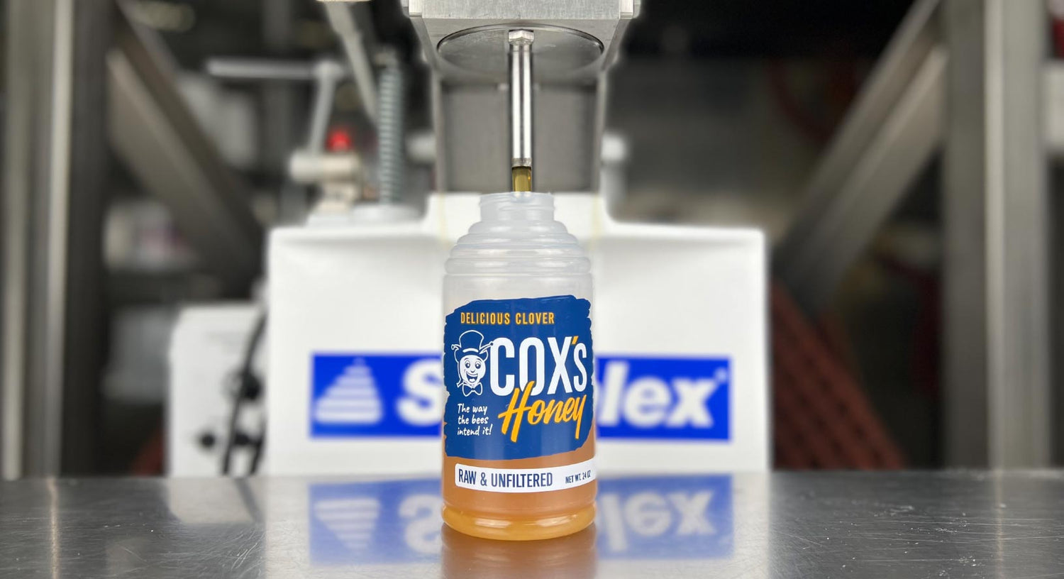 Coxs Honey raw honey bottle filling process